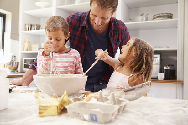 Father baking with children