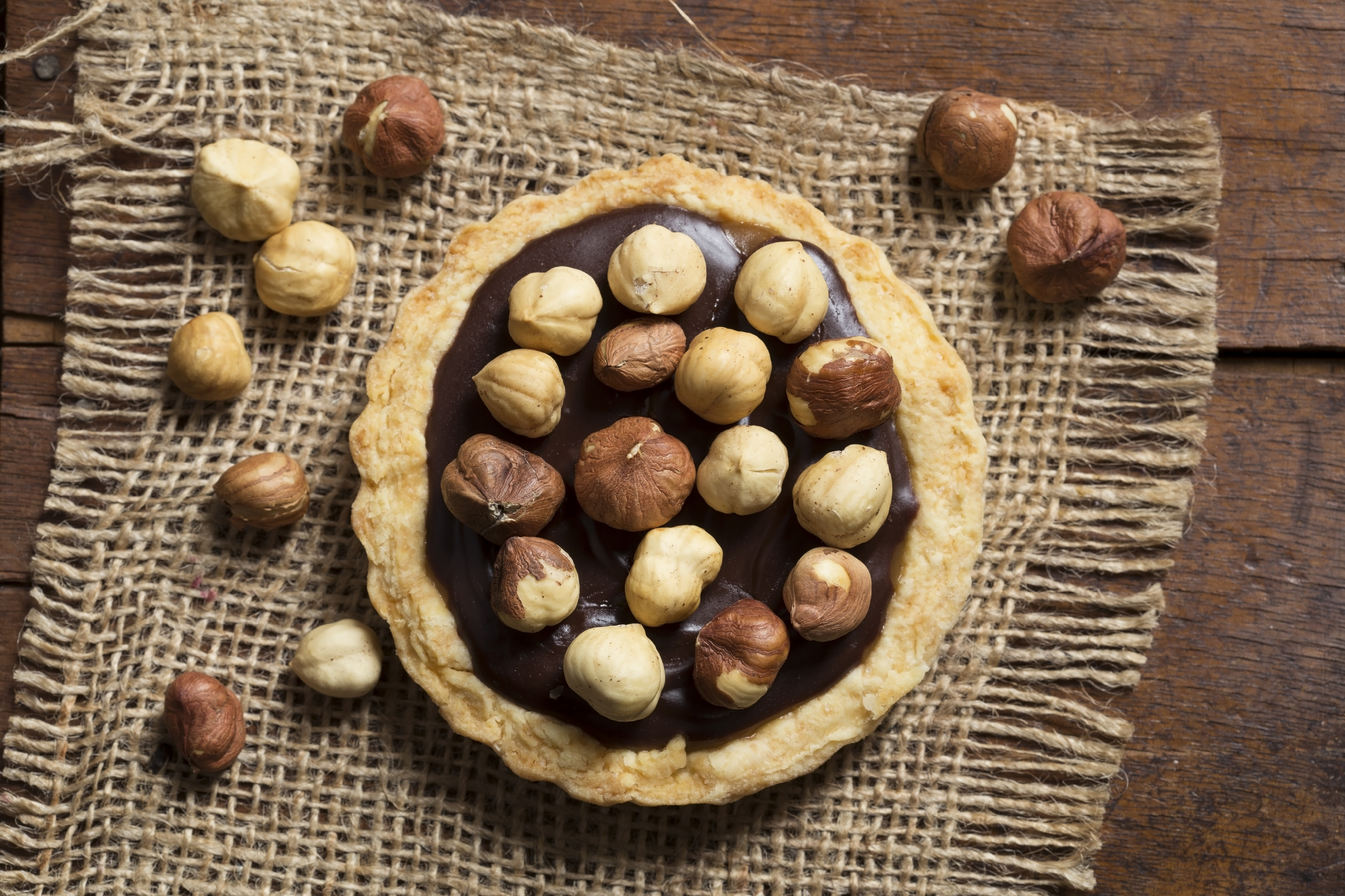 Chocolate and caramel tart with hazelnuts