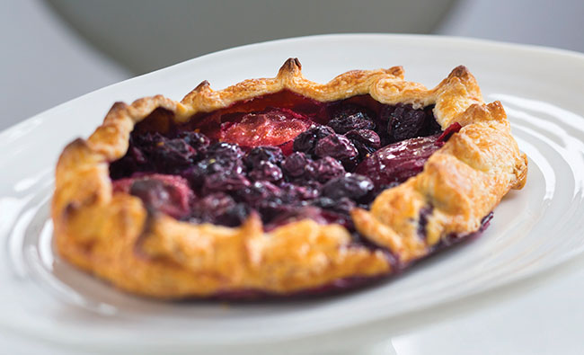 Galettes are wonderfully simple desserts to make, and are a great way to use up the last of the season fruit. This gluten-free plum and blueberry galette is filled with fresh plums and blueberries, which makes for a winning flavour combination! 