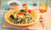 A perfect lunch for a late summers day, this cauliflower and pistachio couscous with halloumi and vegetable kebabs is sure to hit the spot!