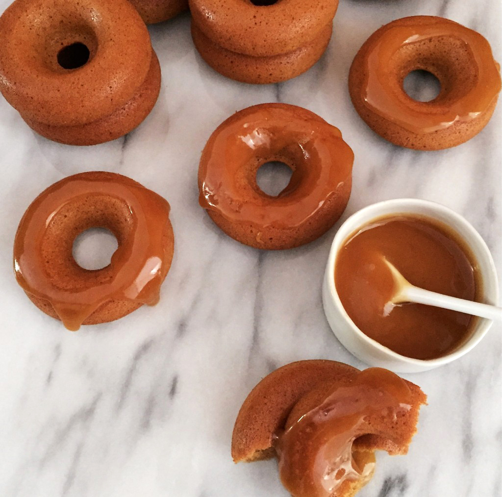 Gluten-free baked doughnuts with dairy-free salted caramel sauce