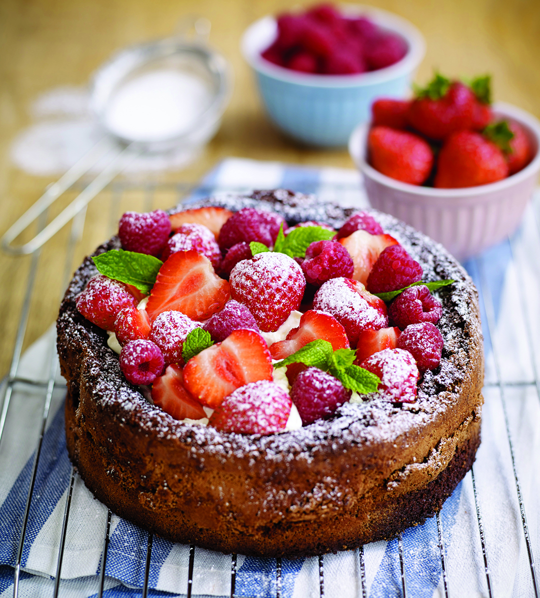 Gluten-free chocolate cake with berries