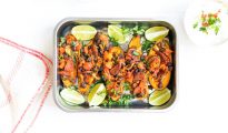 Baked Sweet Potatoes topped with a Chorizo, Black Beans, Lime, Coriander & Basil Dressing
